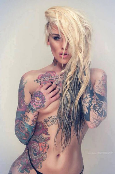Tattoo Lovers Gather around for Epic Body Art